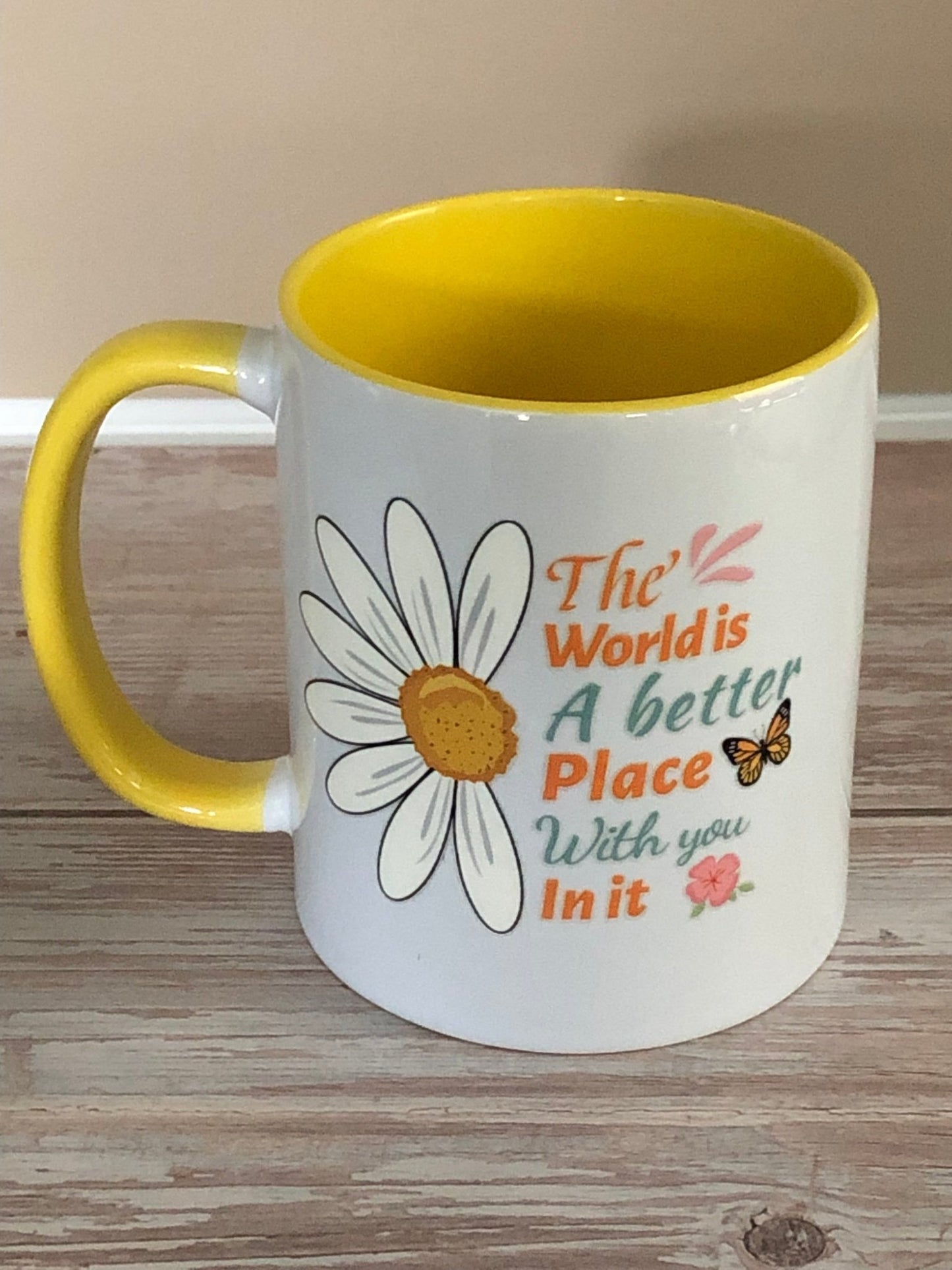 The world is a better place Mug - Caprice Customz LLC